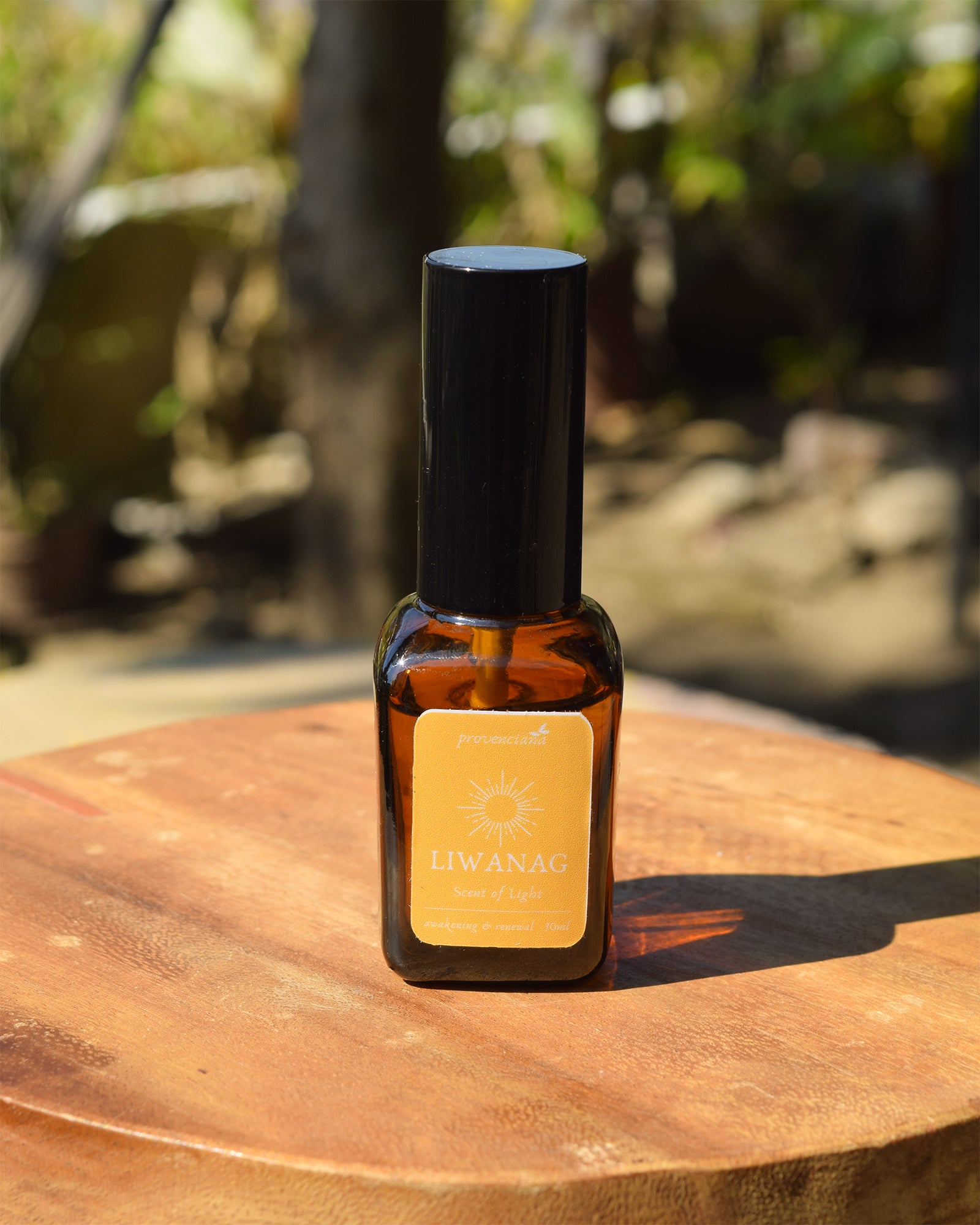 A 30ml amber glass bottle of Provenciana Liwanag "Scent of Light" ritual mist, featuring Philippine botanical ingredients.